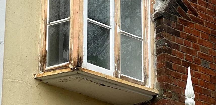 Partially decayed wooden window frame