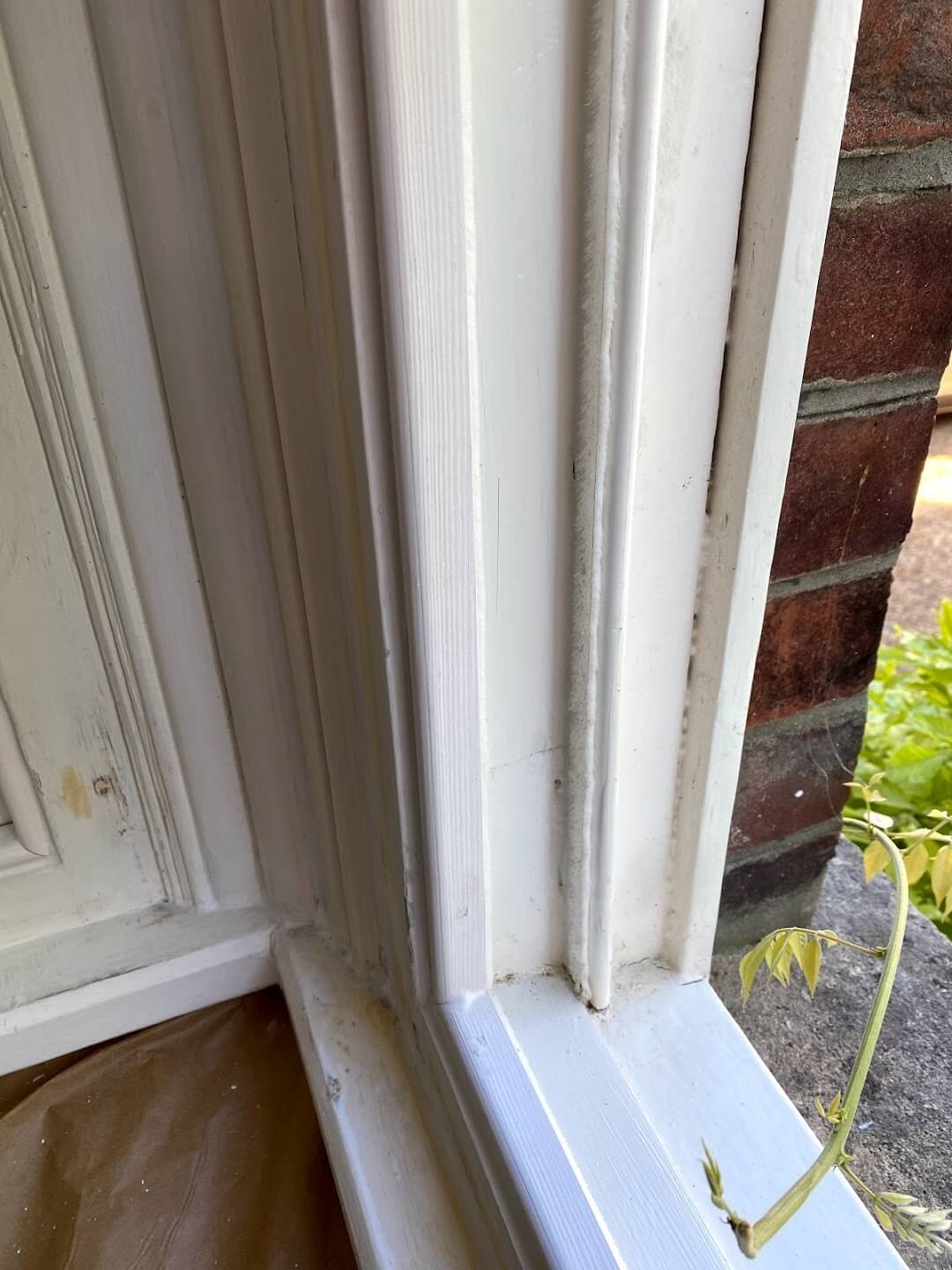 Draught-proofing brushes visible when sashes are open