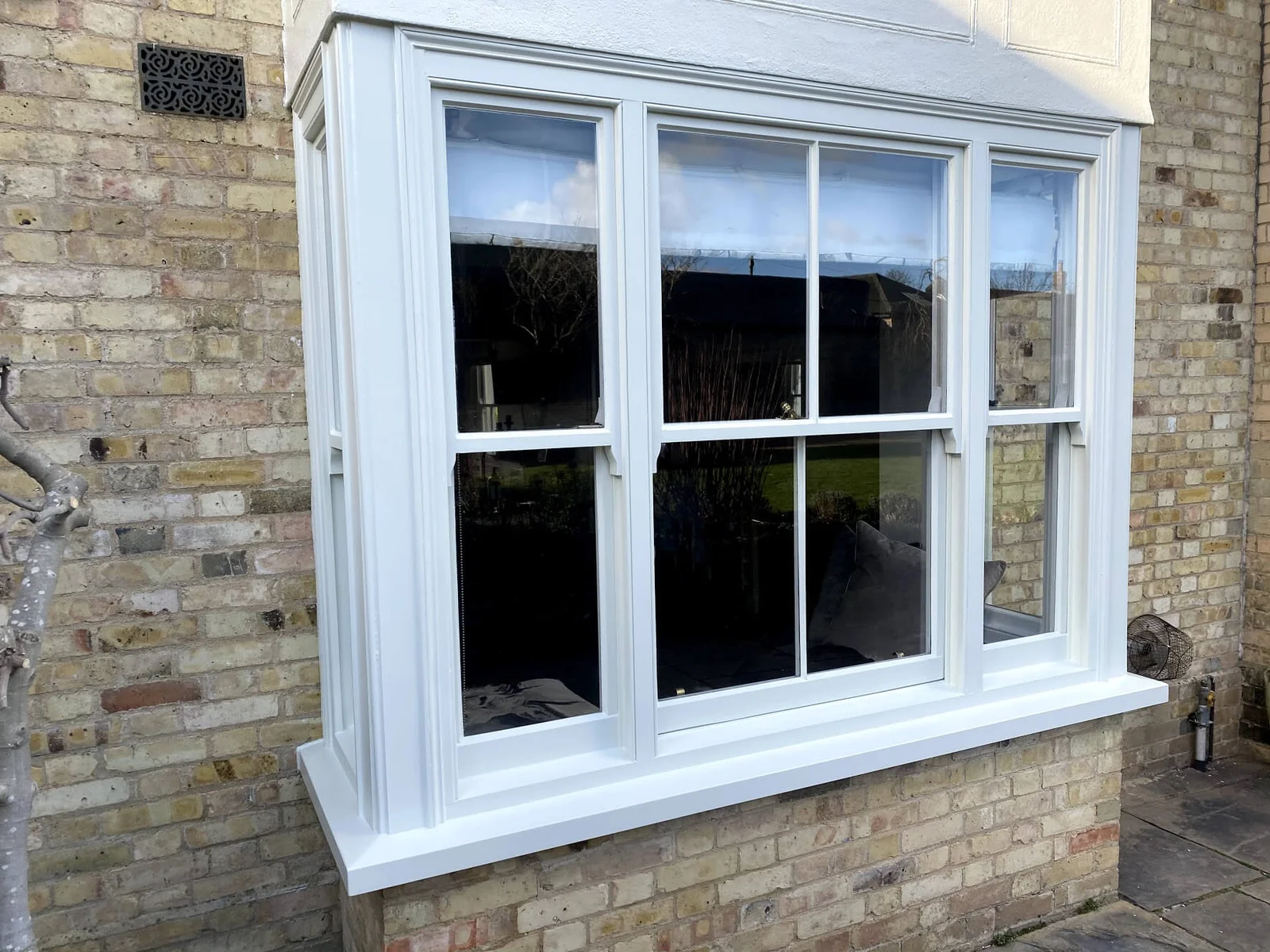 Repaired and repainted timber sash window